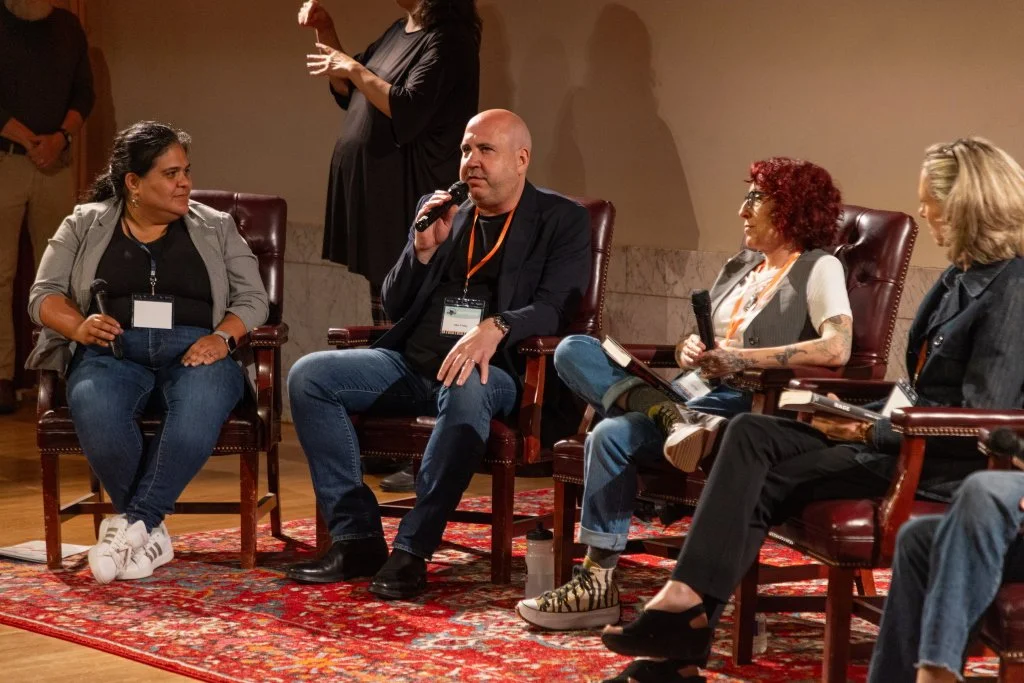 authors speaking to an audience in the lecture hall of the Carnegie Library of Pittsburgh